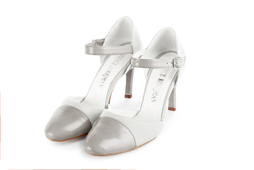 Women's pearl grey and pure white elegant closed-back heels, with an instep strap. Round toe. High slim heel - Front view